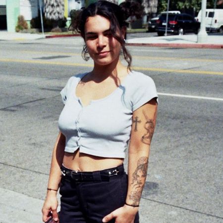 Gigi Santo Pietro posed with her inked arm for a picture. 